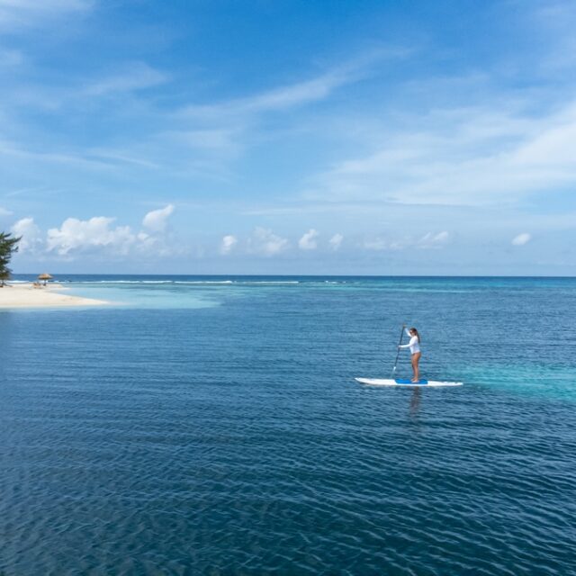 Paddle board around Manta Island, Belize