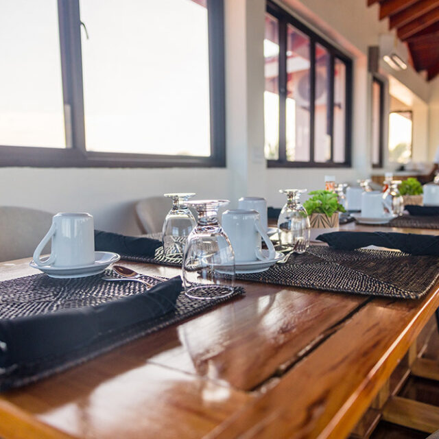 Close up of a set table in the Black Coral Restaurant at Manta Island Resort.