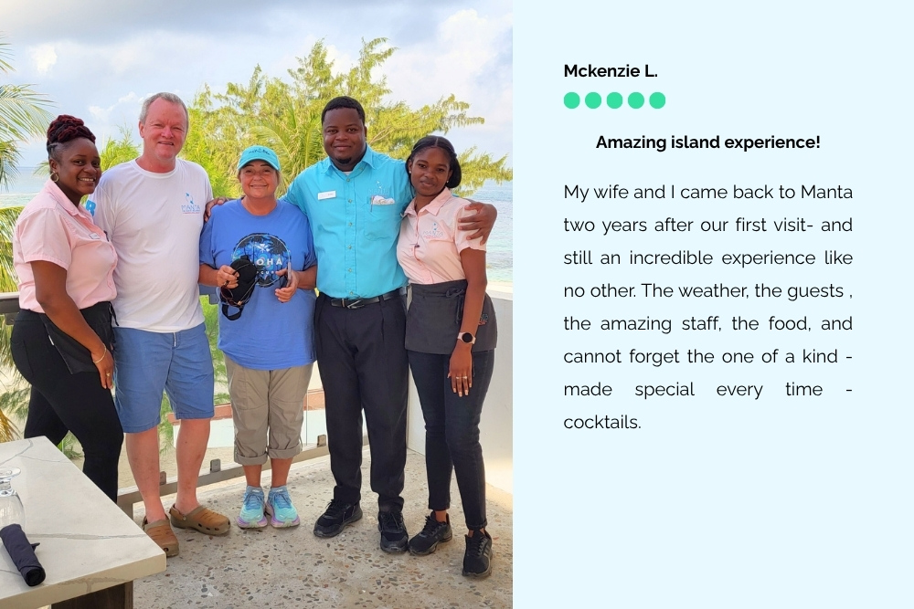 Guests with friendly staff at Manta Island Resort Belize